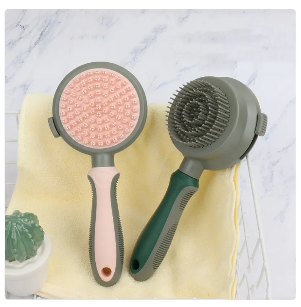 Image showcasing both sides of the double-sided cat grooming brush: one for detangling, one for removing loose hair.