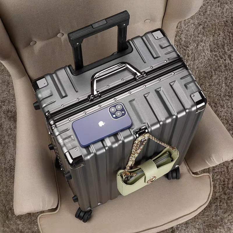 Sleek hard shell suitcase with aluminum frame, modern design for stylish & secure travel.