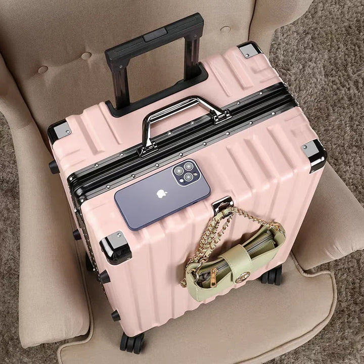 Protective hard shell suitcase with a secure aluminum frame, ensuring safe travel for belongings.
