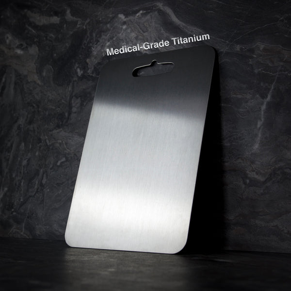 Hygienic titanium kitchen cutting board. BPA-free & microplastic-free, ideal for healthy food prep.