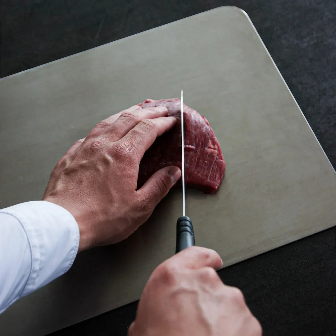 Premium titanium cutting board. Durable, BPA-free, hygienic & scratch resistant for healthy kitchen food prep.
