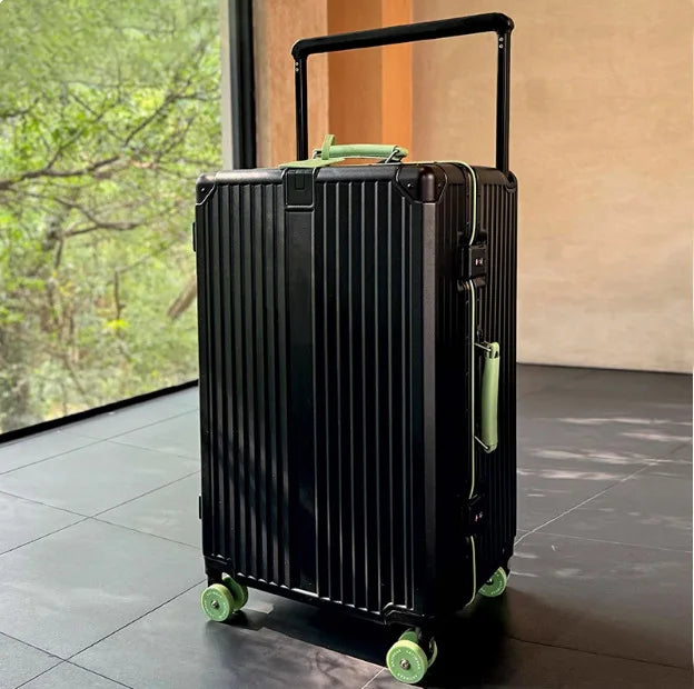 Compact hard-shell spinner suitcase, carry-on size with secure zippers for effortless travel.