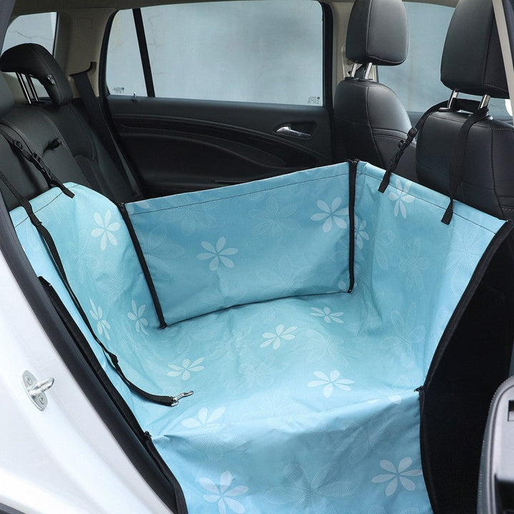Easy-install waterproof dog car seat cover securely fitted to back seat, offering full vehicle protection for pets.