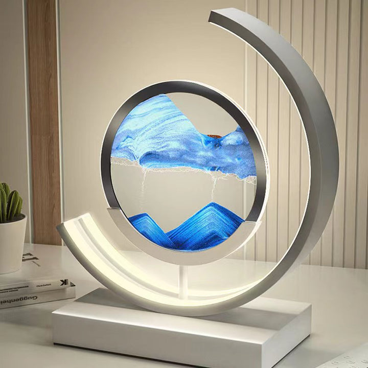 Dynamic Sand Art LED Table Lamp with flowing sandscapes and soft lighting, perfect for home or office decor transformation.