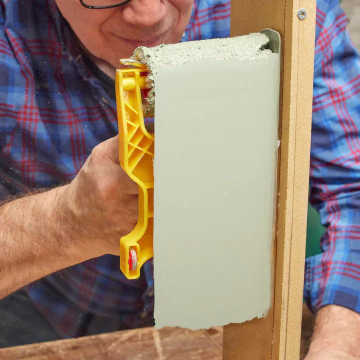 Edge and corner paint roller tool with ergonomic handle and precise side guide for clean lines without tape.