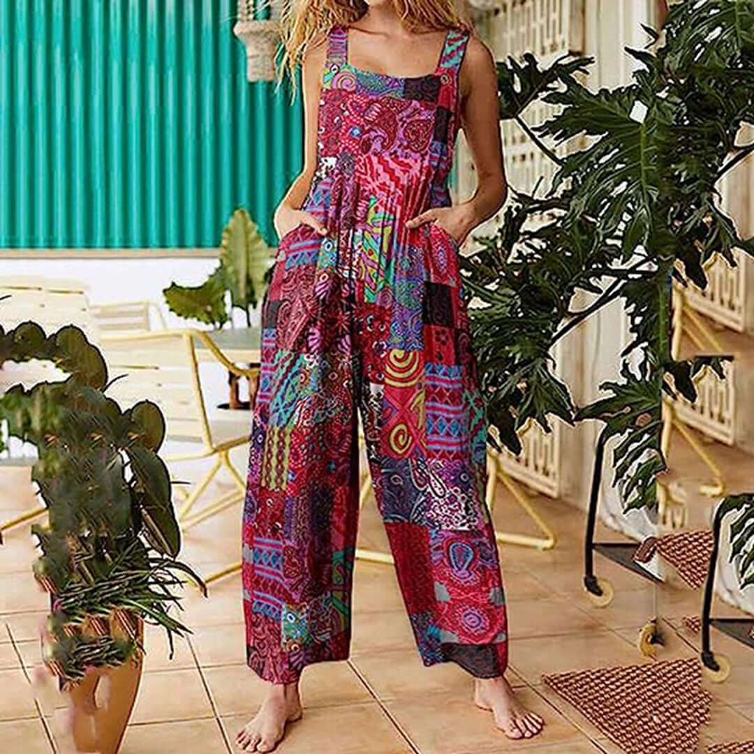 Effortless red wide-leg sleeveless jumpsuit for women, perfect for summer casual wear or elegant evening outfits.