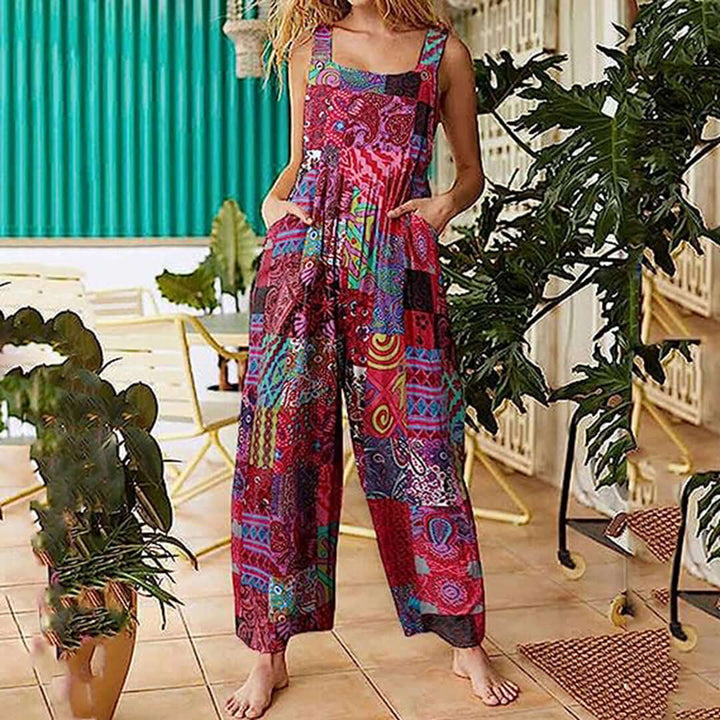 Effortless red wide-leg sleeveless jumpsuit for women, perfect for summer casual wear or elegant evening outfits.