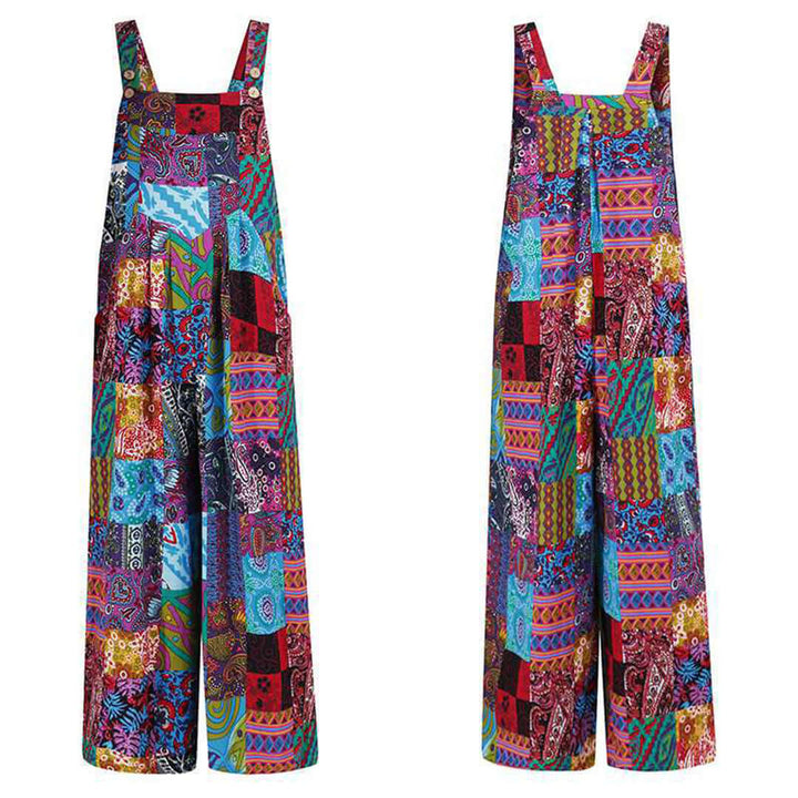 Woman wearing an elegant red wide-leg sleeveless jumpsuit, perfect for a stylish summer or vacation look.