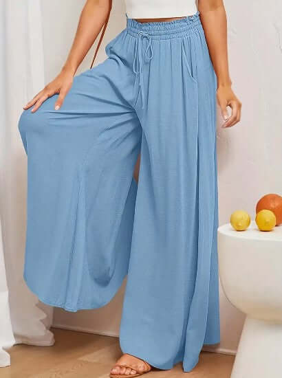 Effortless women's loose fit drawstring trousers, perfect for comfortable summer casual wear.
