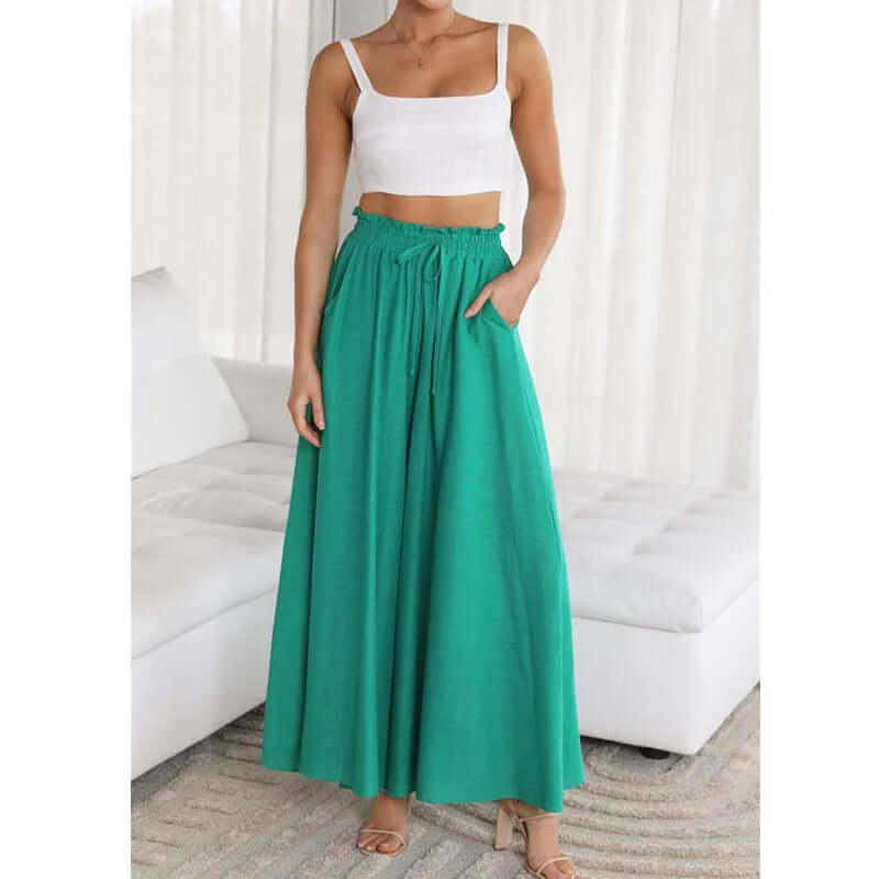 Versatile women's loose fit drawstring trousers, perfect for beach days or stylish urban wear.