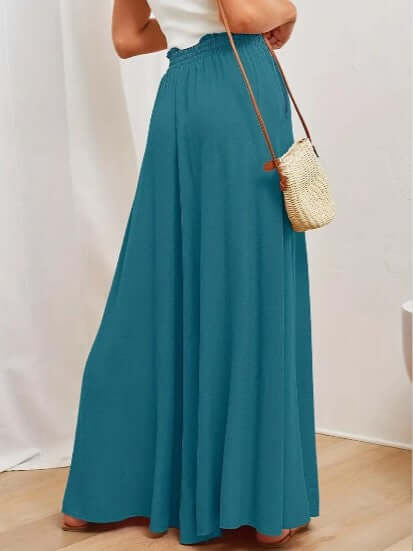 Breathable women's summer pants, loose fit with a drawstring for effortless casual fashion.