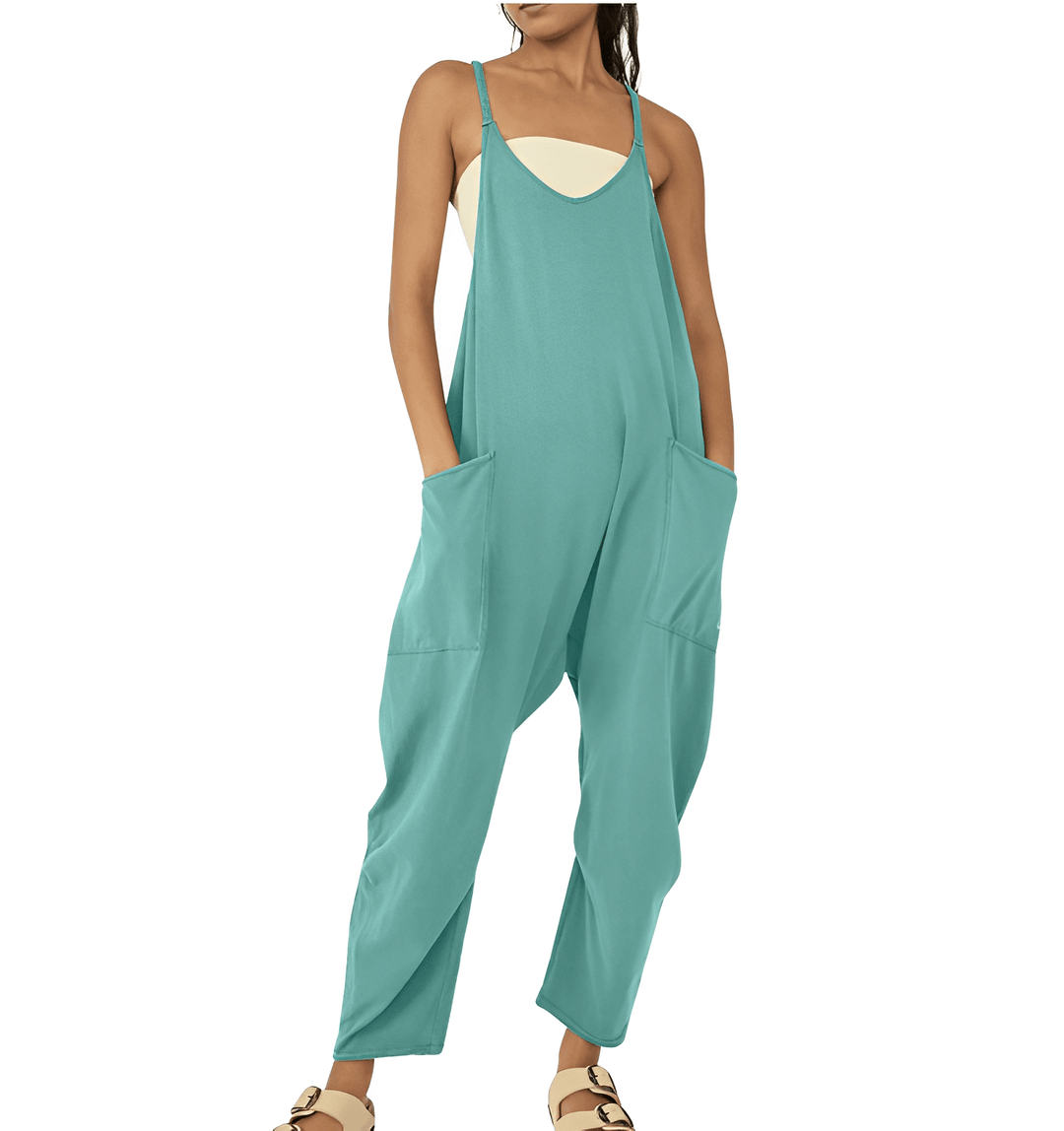 Modern women's sleeveless jumpsuit, offering a relaxed fit, pockets, and easy one-piece style.