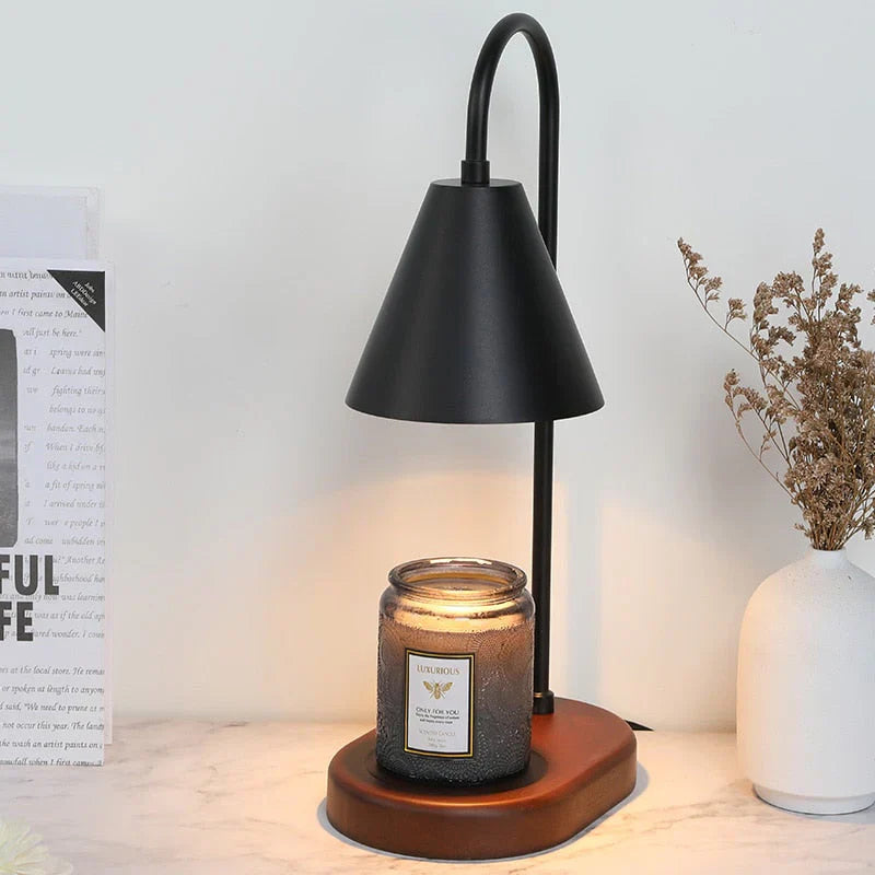 Bedside electric candle warmer lamp, providing gentle light & flameless aromatherapy for serene evenings.