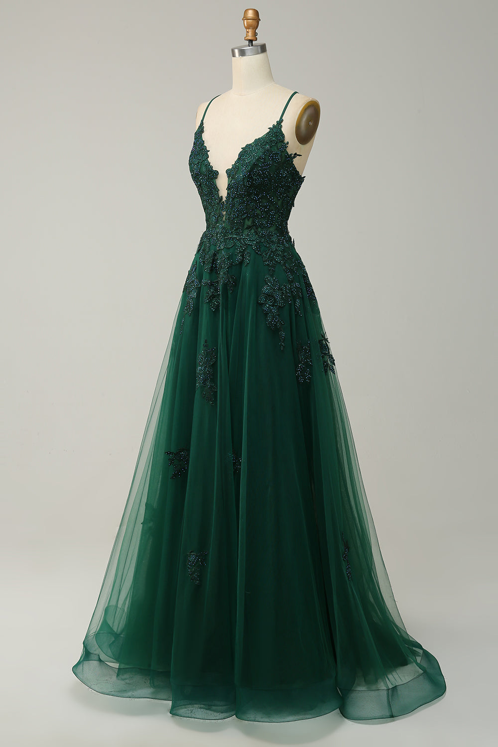Graceful A-line prom gown with intricate appliqué work and a flattering silhouette.