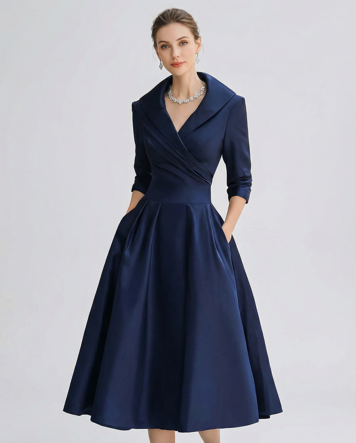 Chic A-line midi dress with stylish lapel design & pleated waist, ideal for spring/summer elegance.