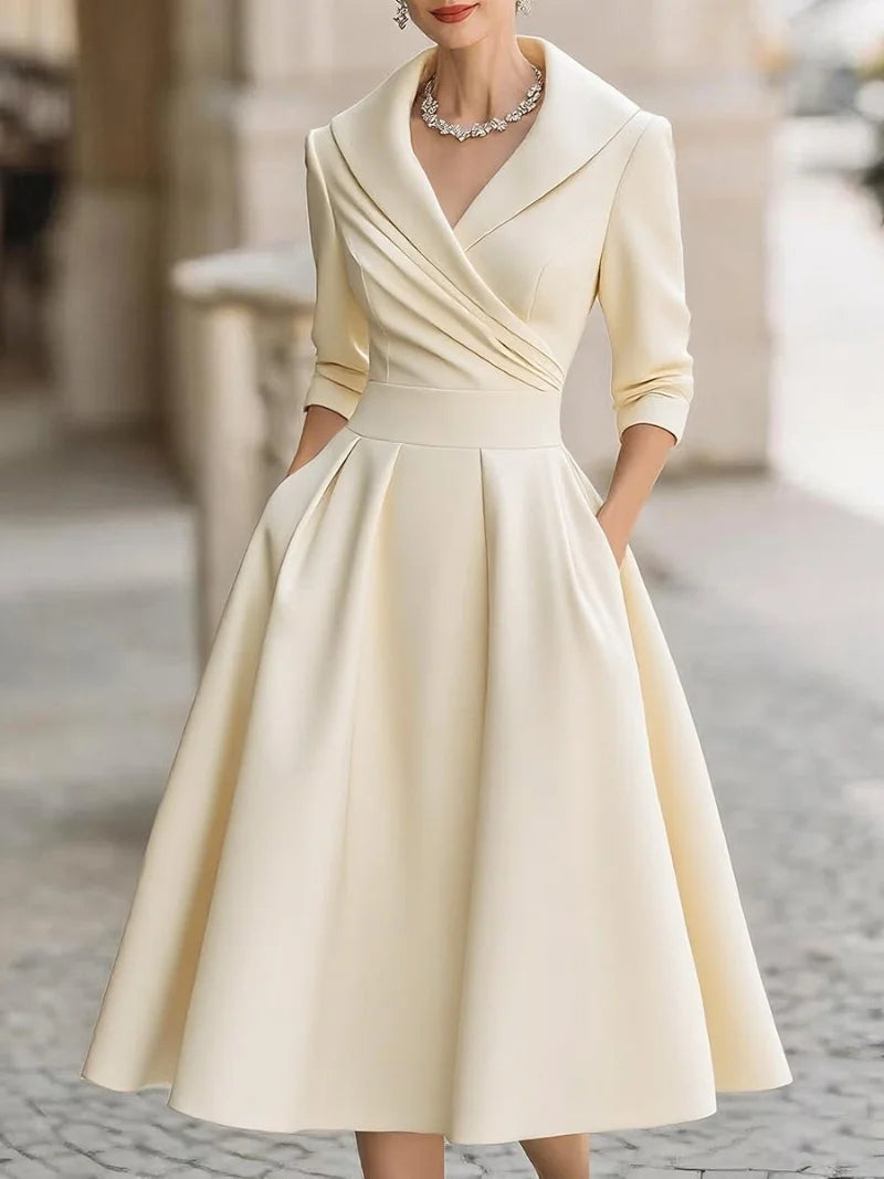 Women's elegant A-line midi dress with lapel, perfect for chic spring/summer day fashion.