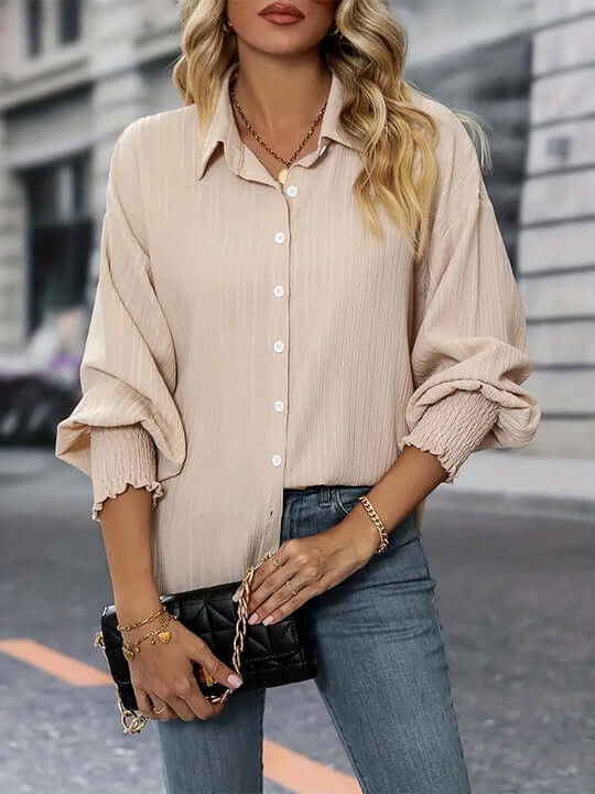 Chic women's apricot ruffled top, elegant long sleeve shirt for spring, easily transitions from office to casual.