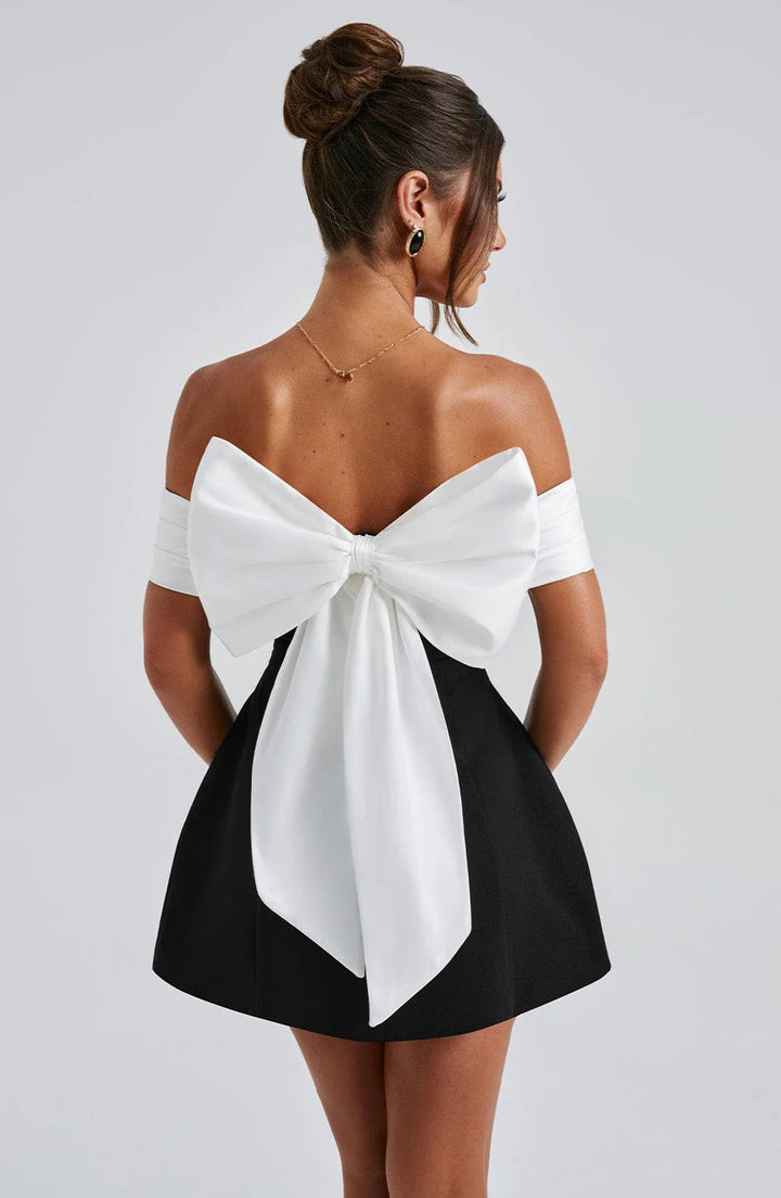 Structured black party mini dress for women. Ideal elegant formal wear for special evening events.