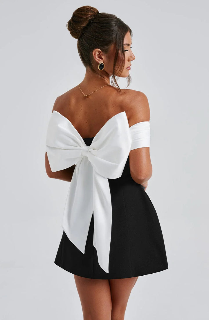 Versatile elegant black mini dress for women. Great for evening parties, cocktails & formal special occasions.