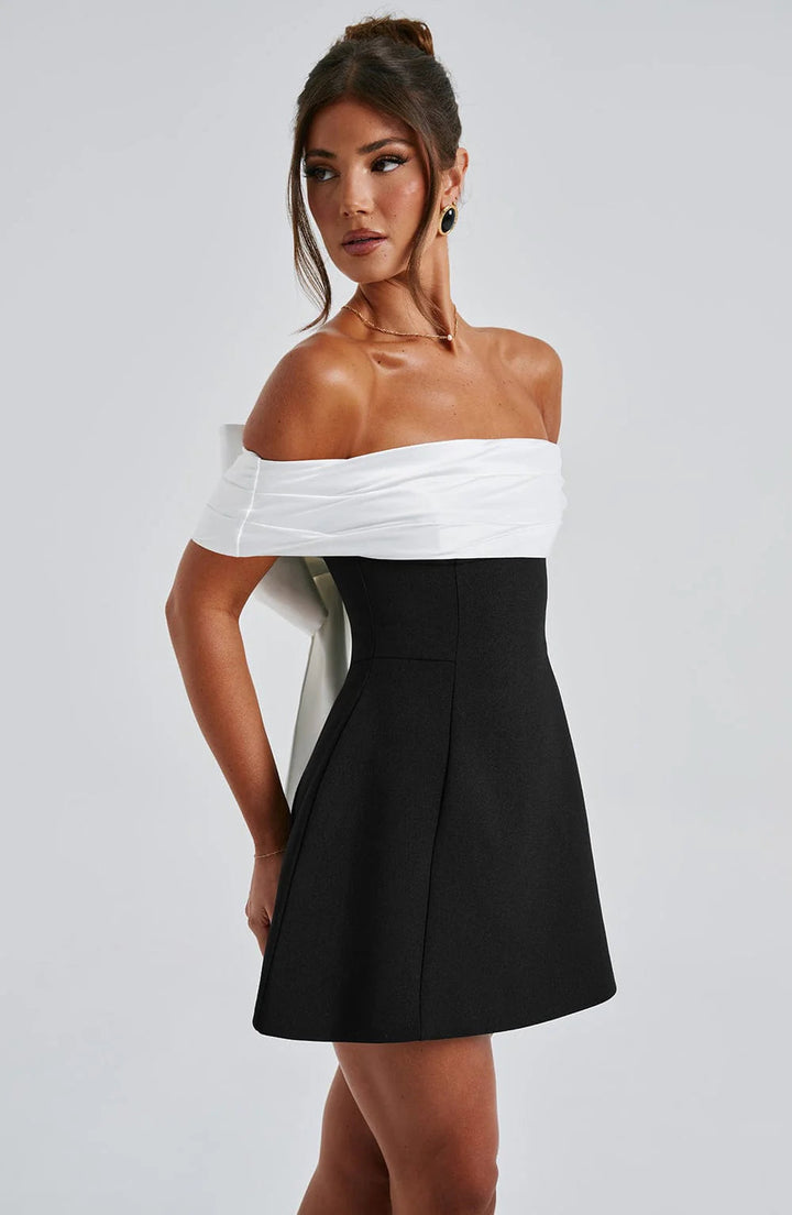 Women's Bardot black mini dress. Elegant evening party wear, ideal for cocktails & formal events.