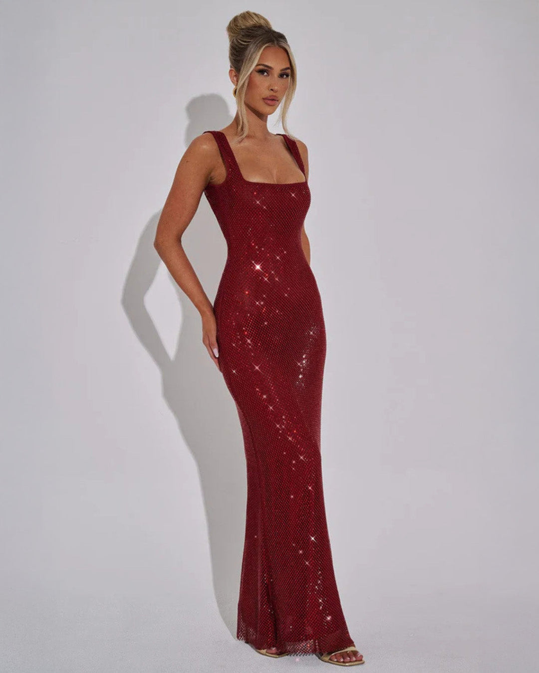 Gold embellished long evening gown for women, an elegant maxi dress perfect for formal events & celebrations.