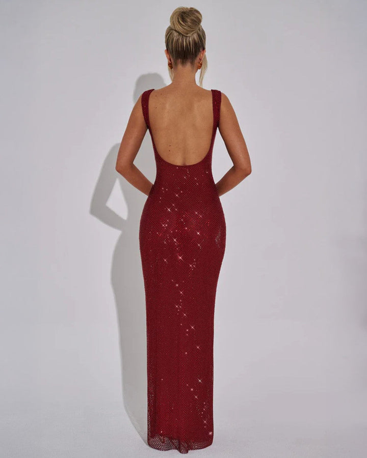 Women's glamorous formal black embellished maxi dress, ideal for evening parties, proms, and special occasions.