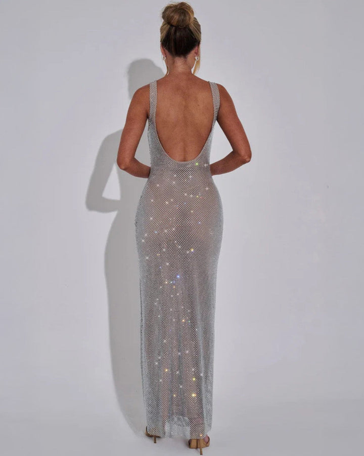 Sparkling silver embellished evening gown for women, a sophisticated maxi dress for formal occasions.
