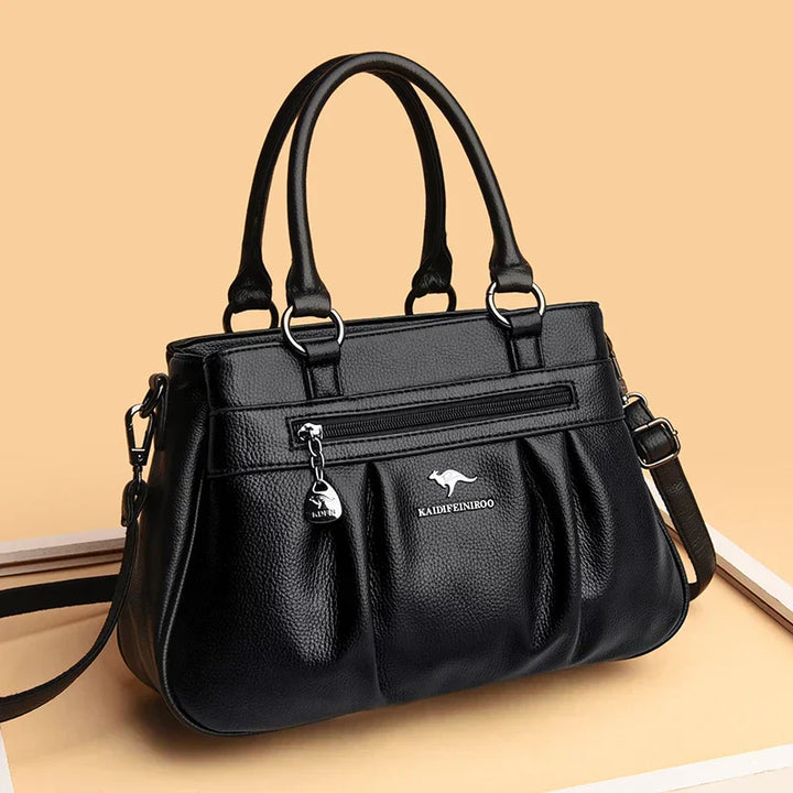 Elegant black faux leather shoulder bag for women, classic style. Perfect for daily use.