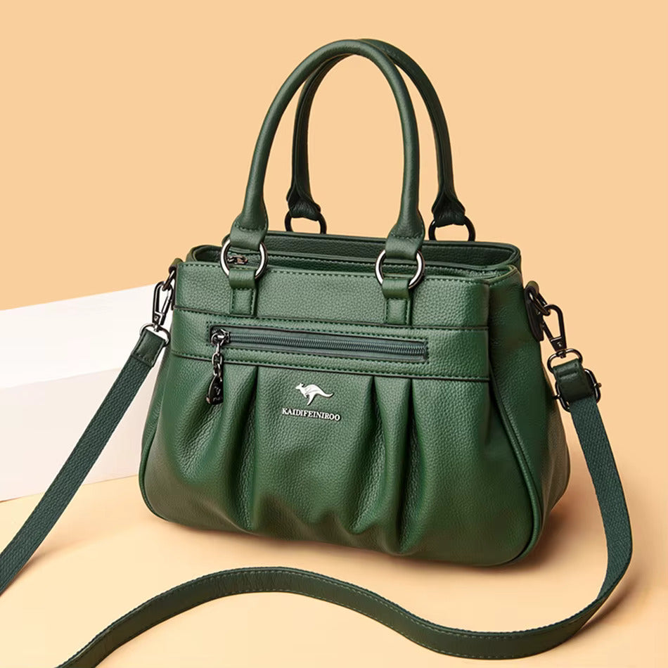 Classic elegant faux leather handbag for women, perfect as a versatile shoulder bag.