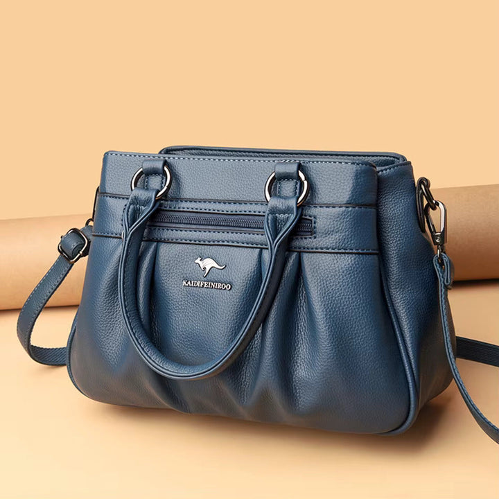 Women's sophisticated faux leather shoulder bag, ideal for both casual and elegant outfits.