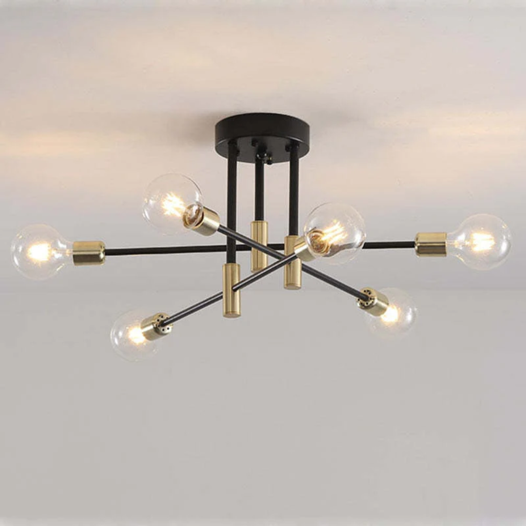 Contemporary black & gold LED ceiling light, emitting warm white illumination. Elegant home fixture.