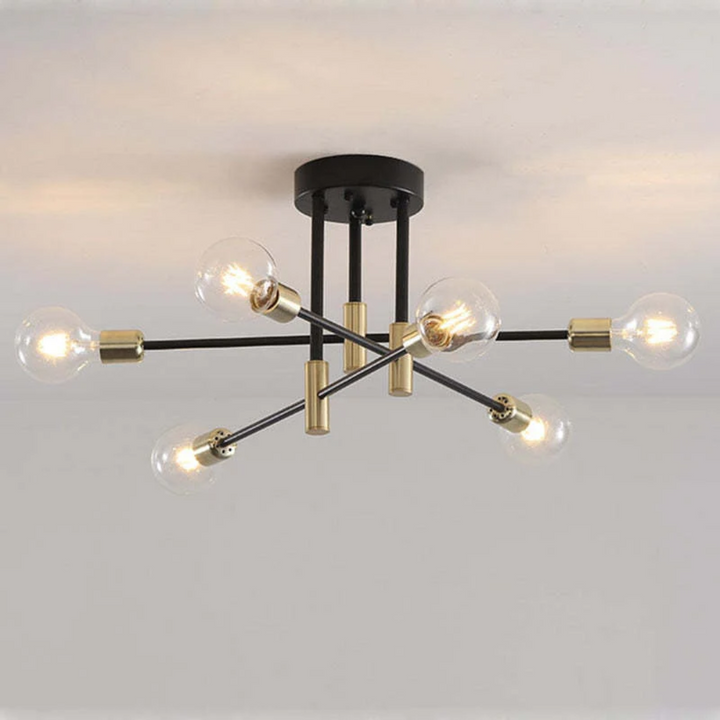 Contemporary black & gold LED ceiling light, emitting warm white illumination. Elegant home fixture.