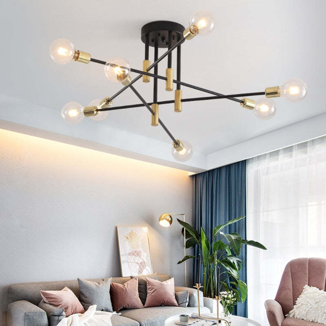 Black & gold LED ceiling fixture illuminating a modern luxury home interior. Elegant indoor lamp.