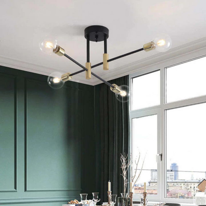 Modern black & gold LED ceiling lamp, providing elegant light for a stylish living space.