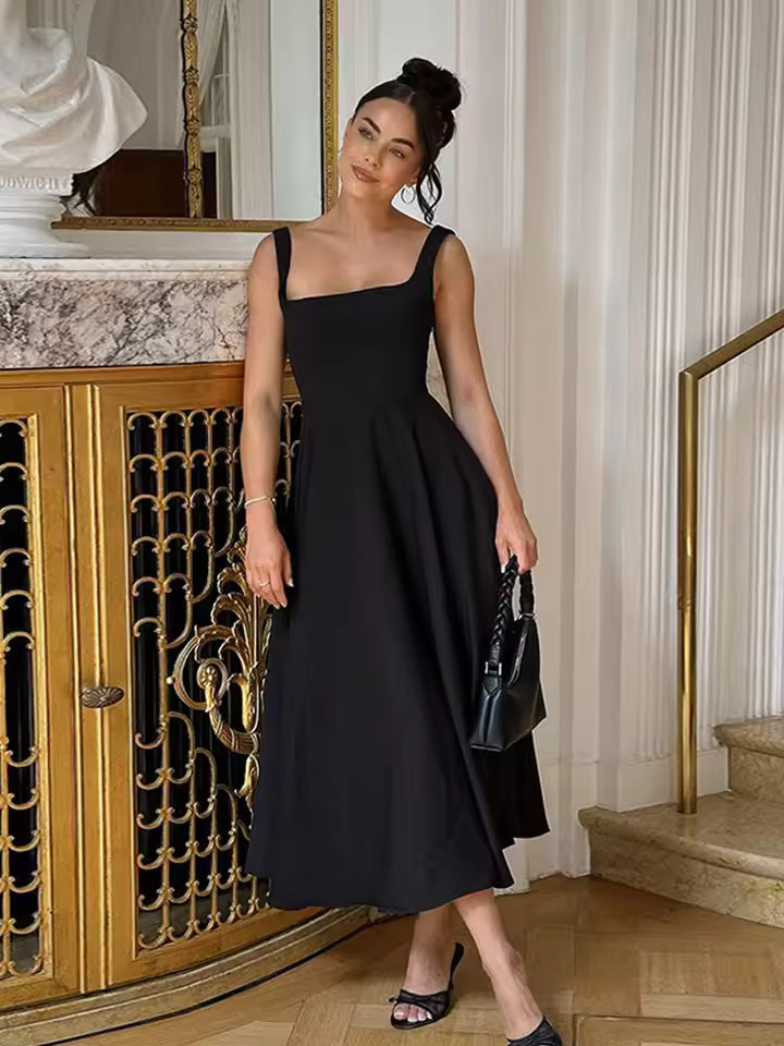 Elegant black midi formal evening dress for women, perfect for special occasions or as a wedding guest.