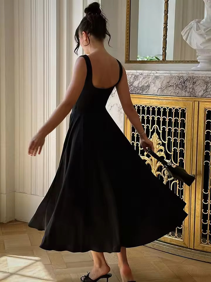 Sophisticated sleeveless midi cocktail dress for women, ideal for party wear, evening events, or formal occasions.