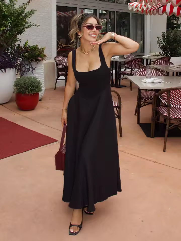 Stylish black formal midi dress for women, a sophisticated choice for evening, cocktail, or wedding guest attire.
