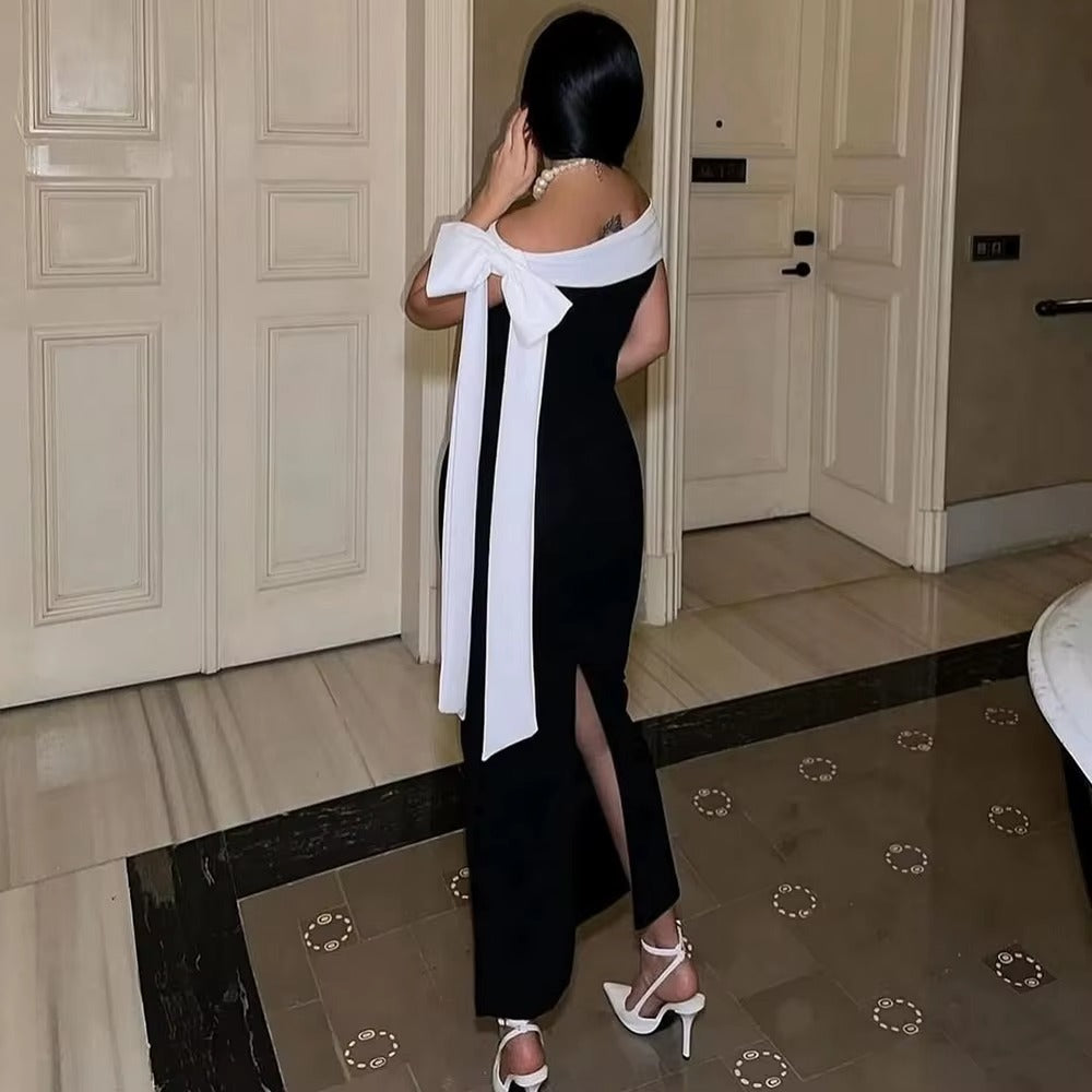 Timeless women's elegant off-shoulder midi evening dress. Black formal wear for special occasions & party fashion.