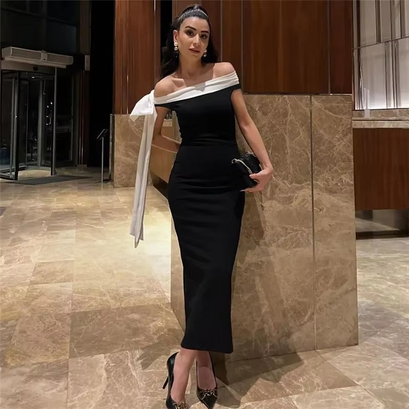 Stunning black off-shoulder midi dress for women. An elegant choice for an evening gown, formal wear & special events.