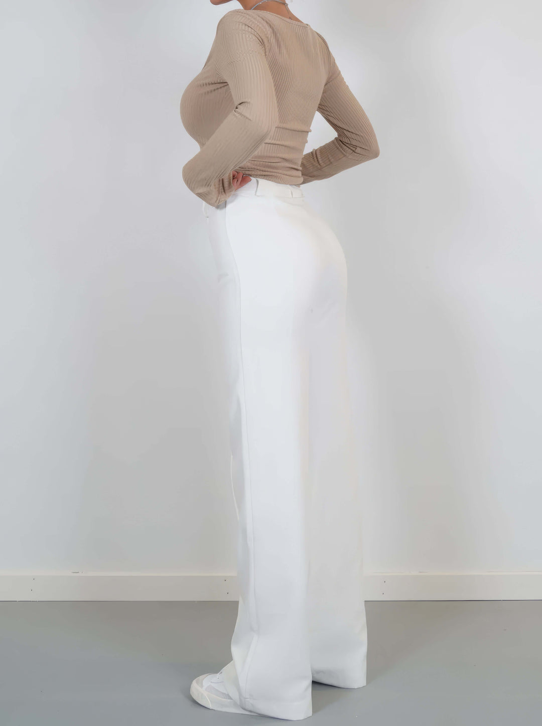 Brown wide leg pants for women, featuring an elegant design and comfortable, flowy silhouette.