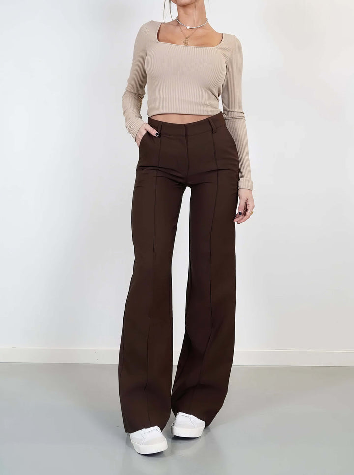 Flowy polyester wide leg trousers for women, designed for ultimate comfort and refined style.