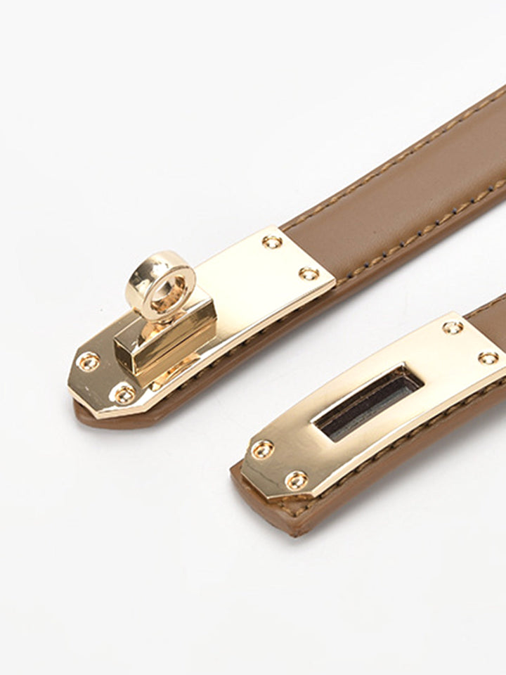Stylish women's brown waist belt with an elegant gold twist-lock buckle, perfect for dresses and outfits.
