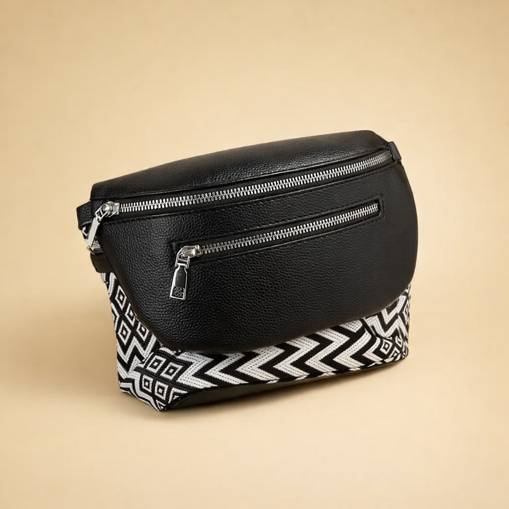 Elegant black women's crossbody belt bag. Modern, minimalist, and versatile fashion accessory for everyday chic styling.