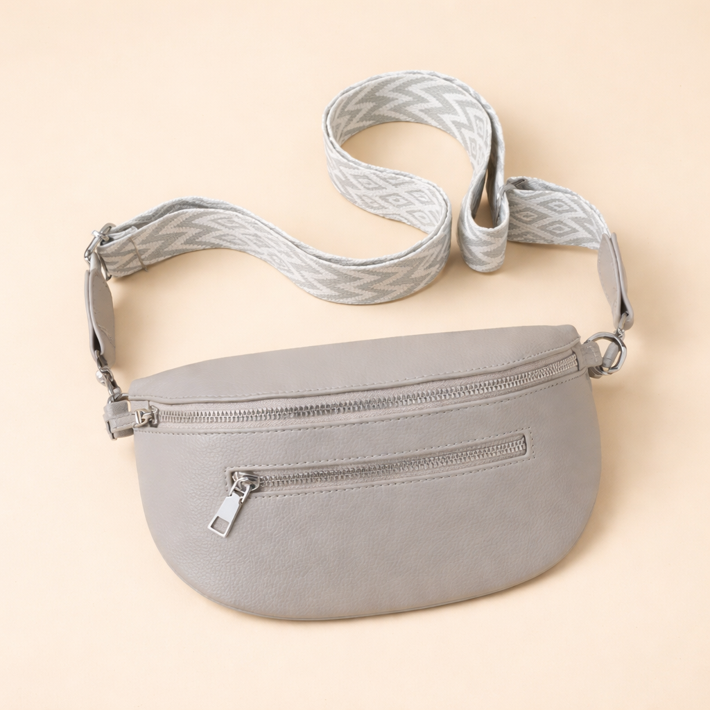 Chic women's versatile beige shoulder/belt bag. A modern, minimalist handbag, perfect for everyday use and styling.
