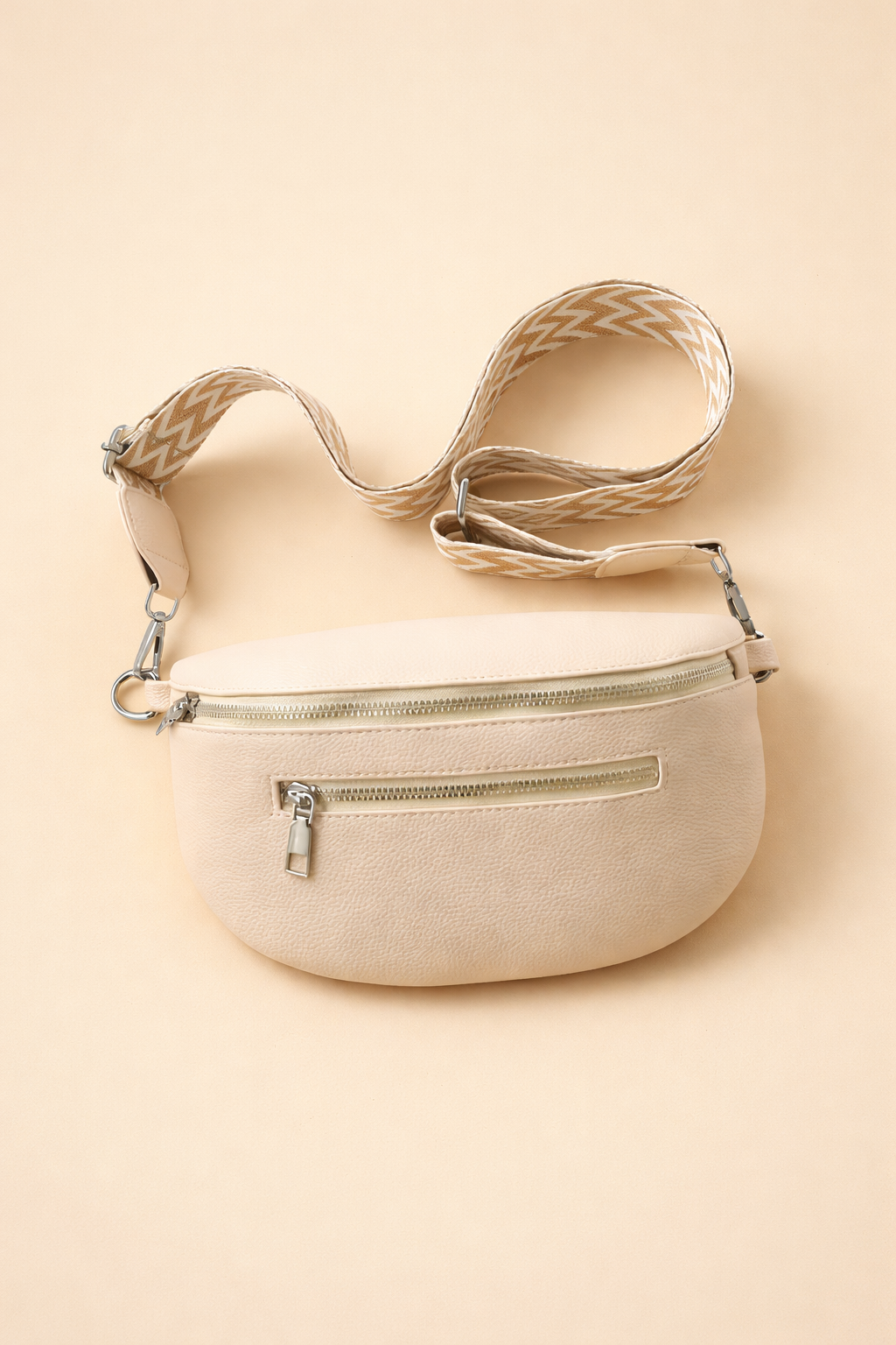 Modern grey women's crossbody belt bag. Elegant, minimalist design, ideal as a versatile fashion accessory & handbag.