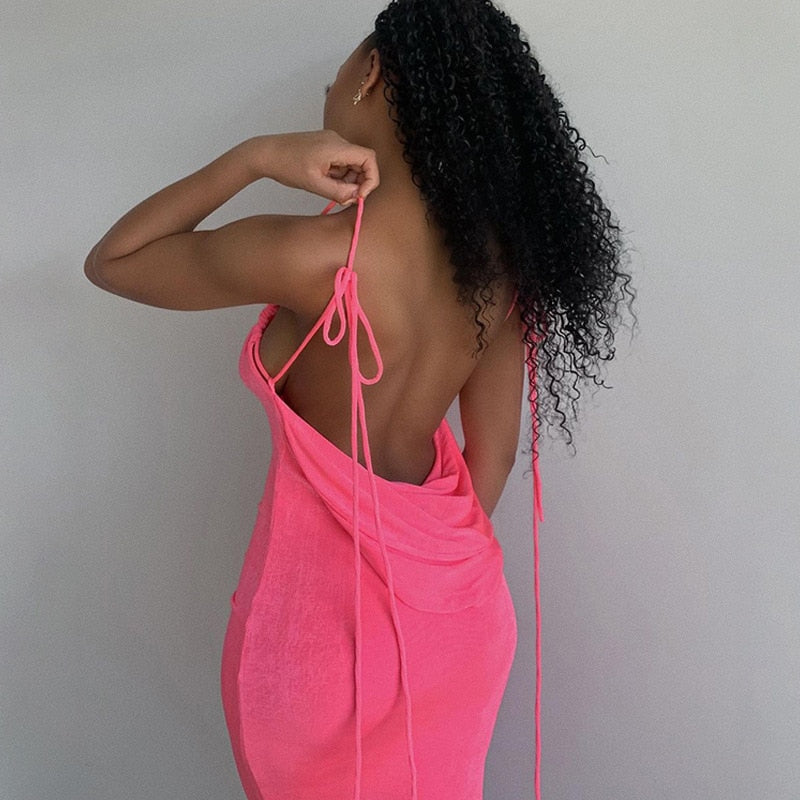 Red women's low back maxi dress, perfect for a striking evening look.