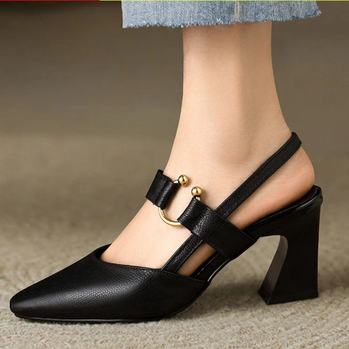 Elegant black women's orthopedic comfort heels, perfect for work or dress, offering all-day supportive wear.