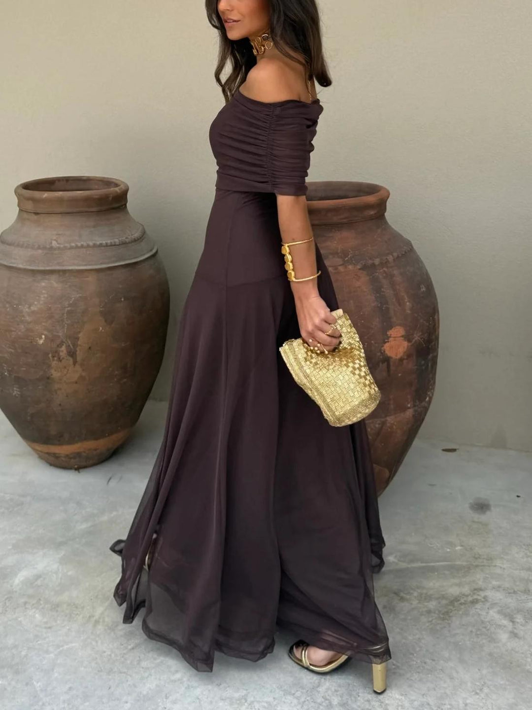 Women's sophisticated off-shoulder brown maxi dress, ideal for evening parties & events.