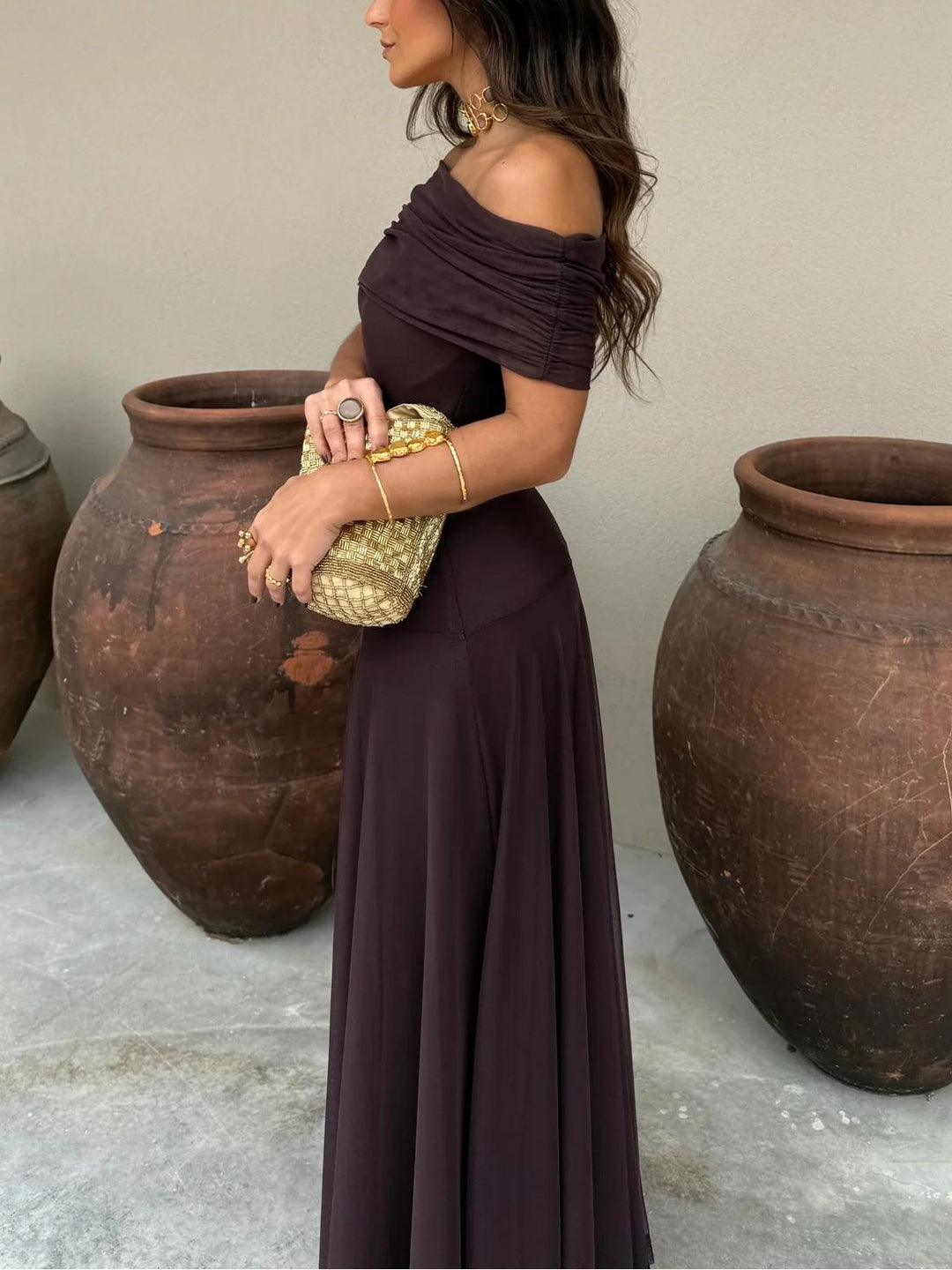 Stunning women's off-shoulder brown maxi dress, perfect for any elegant evening occasion.