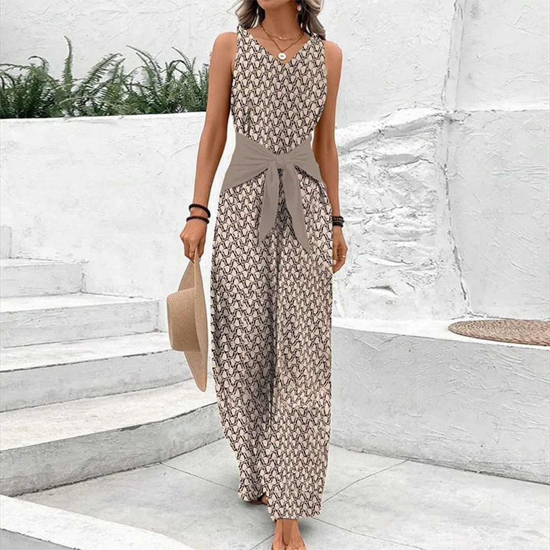Elegant brown V-neck sleeveless jumpsuit for women. Features an adjustable waist for comfortable, effortless summer style.